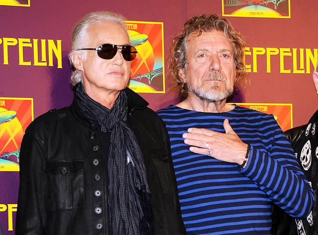 In this Oct. 9, 2012 file photo, Led Zeppelin guitarist Jimmy Page, left, and singer Robert Plant appear at a press conference ahead of the worldwide theatrical release of "Celebration Day," a con ...