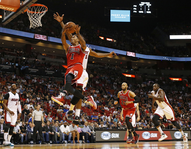 Derrick Rose Dunks On Joel Anthony In Heat-Bulls Game (VIDEO)