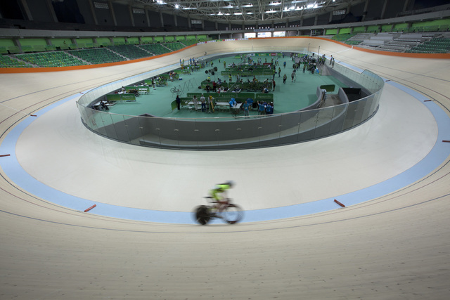 A cyclist rides his bike during a test event at the new velodrome, the last venue of the Rio 2016 Olympic Park to be delivered, in Rio de Janeiro, Brazil, Sunday, June 26, 2016. Rio will become th ...