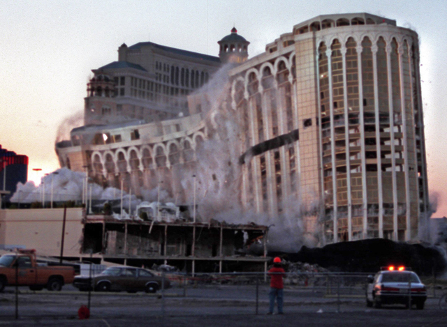 The Aladdin hotel-casino collapses under its own weight as it is imploded on the Las Vegas Strip, April 27, 1998. (Jeff Scheid/Las Vegas Review-Journal)