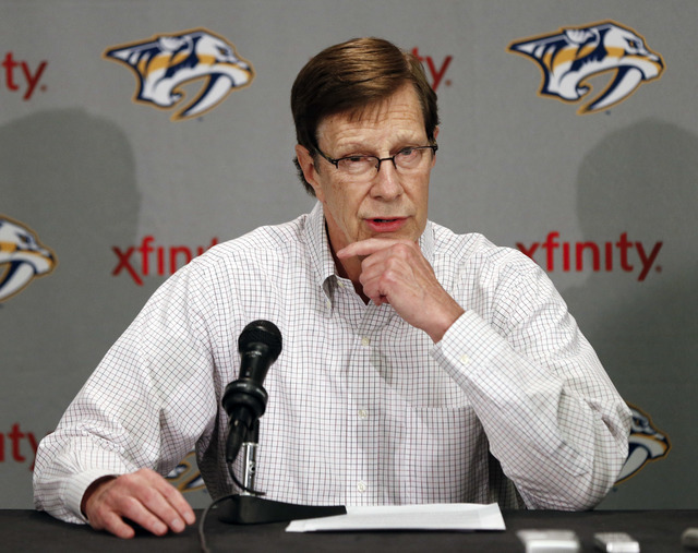 In this April 14, 2014, file photo, Nashville Predators general manager David Poile answers questions at a news conference. (Mark Humphrey/AP)