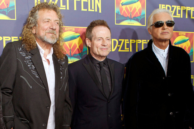 Led Zeppelin singer Robert Plant, bassist John Paul Jones and guitarist Jimmy Page attend at the "Led Zeppelin: Celebration Day" premiere in New York, Oct. 9, 2012.  (PDario Cantatore/Invision/AP)