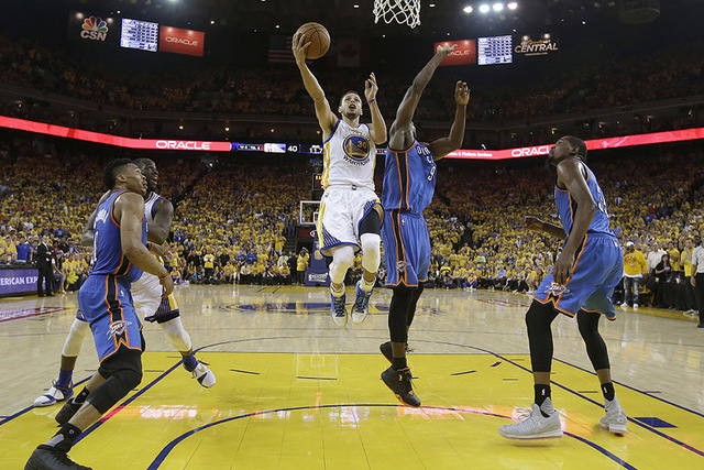 Golden State Warriors guard Stephen Curry (30) shoots against Oklahoma City Thunder forward Serge Ibaka (9) during the first half of Game 7 of the NBA basketball Western Conference finals in Oakla ...