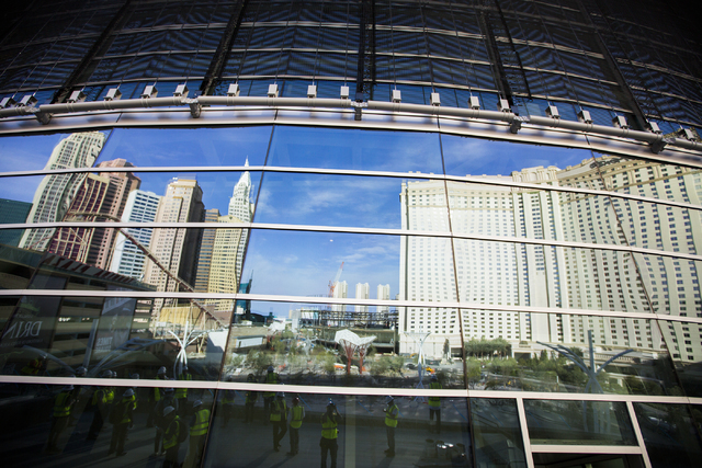 A reflection of New York-New York, left, and the Monte Carlo is seen on the T-Mobile Arena on Saturday, March 12, 2016. (Jeff Scheid/Las Vegas Review-Journal Follow @jlscheid)