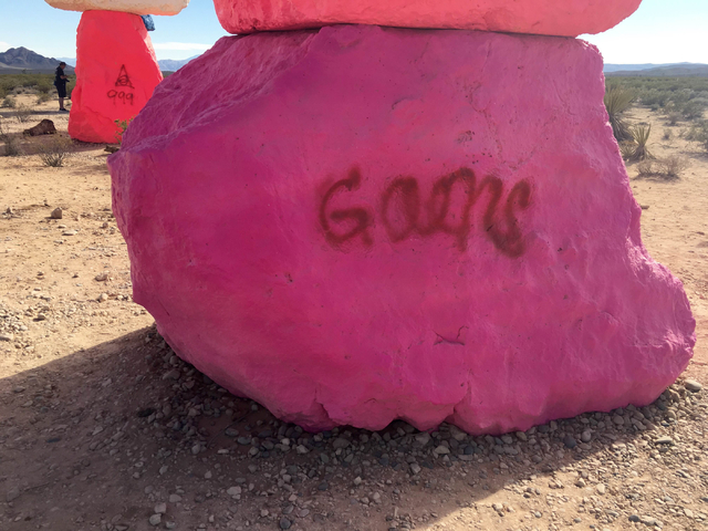 Vandals defaced several of the limestone boulders that make up the Seven Magic Mountains public land art project created by artist Ugo Rondinone. (Natalie Bruzda/Las Vegas Review-Journal)