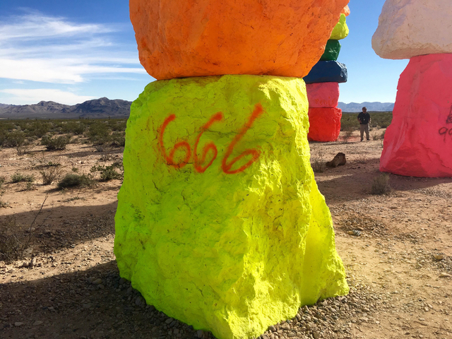 Vandals defaced several of the limestone boulders that make up the Seven Magic Mountains public land art project created by artist Ugo Rondinone. (Natalie Bruzda/Las Vegas Review-Journal)