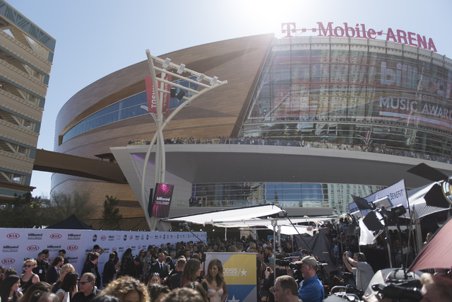 Attendees and press walk along the red carpet during the Billboard Music Awards at T-Mobile Arena in Las Vegas Sunday, May 22, 2016. (Jason Ogulnik/Las Vegas Review-Journal)