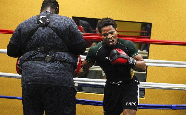 Shawn Porter, right, works out at Porter Hy-Performance Center, 2206 Paradise Road, in Las Vegas on Wednesday, June 8, 2016. Porter is slated to fight Keith Thurman on June 25. (Loren Townsley/Las ...
