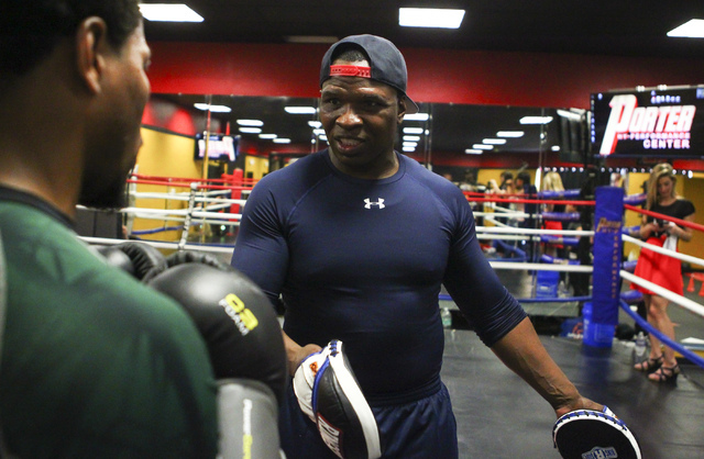 Shawn Porter, left, trains with his father, Kenny Porter, at Porter Hy-Performance Center, 2206 Paradise Road, in Las Vegas on Wednesday, June 8, 2016. Porter is slated to fight Keith Thurman on J ...