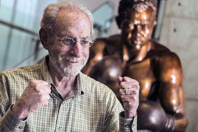 Marc Ratner, vice president of regulatory affairs with the Ultimate Fighting Championship and former executive director of the Nevada State Athletic Commission, poises in front of a statue of boxe ...