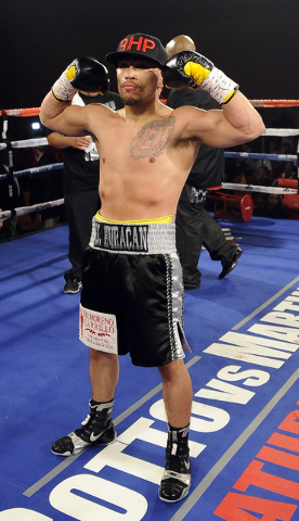 Las Vegas boxer Jesus Gutierrez celebrates after knocking out Pablo Becerra in the first round of their lightweight bout at the Tropicana Hotel Pavilion in Las Vegas Saturday, May 31, 2014. (Josh  ...