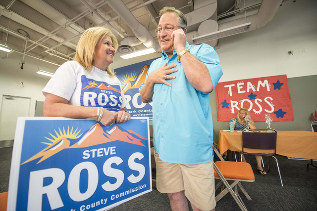 Kelli Ross and her husband Steve make phone calls during the Steve Ross for Clark County Commissioner District B campaign on Tuesday, June 14, 2016 at his campaign headquarters in Las Vegas. (Jaco ...