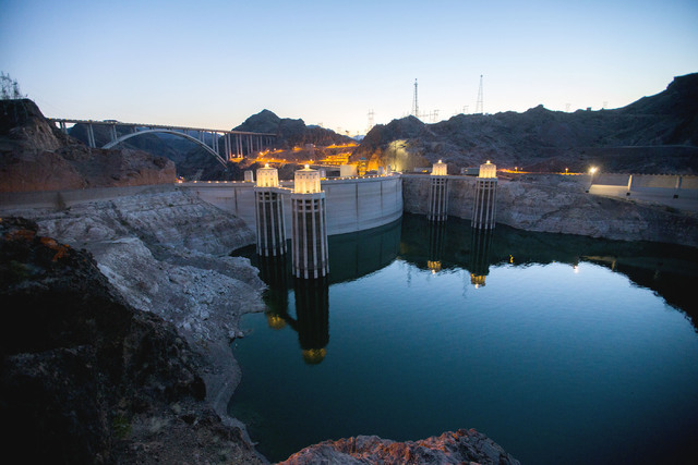 Lake Mead behind Hoover Dam reflects the sky at dusk on June 5. Since 2014, the U.S. Bureau of Reclamation has been closing the top of the dam to the general public at night. Jeff Scheid/Las Vegas ...