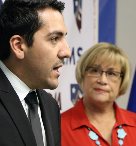 Assemblyman Nelson Araujo, flanked by NVDEMS Chair Roberta Lange, speaks on Monday, June 6, 2016, during a press conference to respond to Donald Trump's attacks accusing U.S. District Judge Gonzal ...