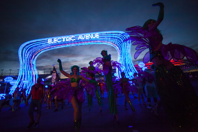 Costumed performers make their way through the festival grounds during the first night of Electric Daisy Carnival at the Las Vegas Motor Speedway in Las Vegas on Friday, June 17, 2016. (Chase Stev ...