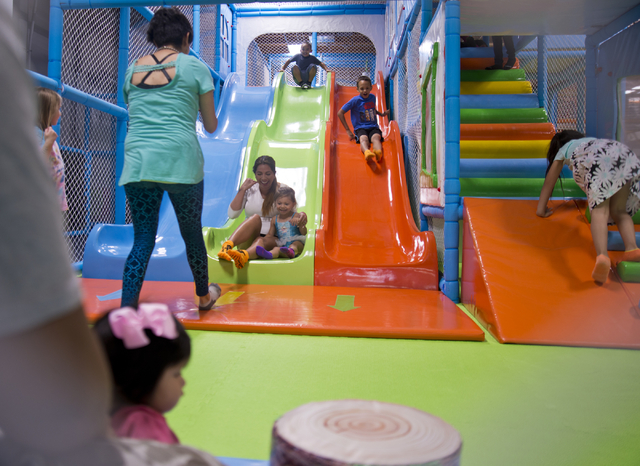 Parents and children play inside Kangamoo Indoor Playground May 27, 2016. Daniel Clark/View