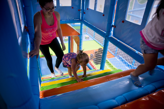 Rachel McGee and her daughter Avery play together inside Kangamoo Indoor Playground May 27, 2016. Daniel Clark/View