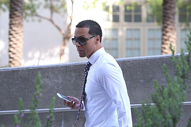 Ernesto Ramos, who pleaded guilty to extorting a prominent businessman, walks to the Lloyd George U.S. Courthouse for his sentencing on Thursday, June 30, 2016. (Bizuayehu Tesfaye/Las Vegas Review ...