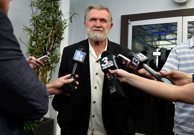 Former NFL player and coach Mike Ditka speaks with the media before the Gridiron Greats Hall of Fame Induction dinner at the Silverton hotel-casino Friday, June 3, 2016, in Las Vegas. (David Becke ...