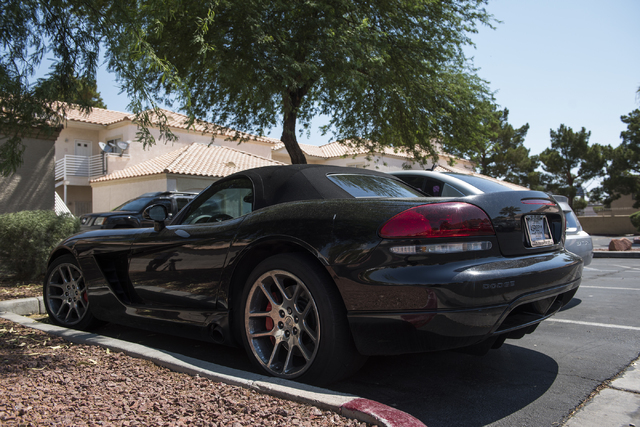 A Dodge Viper is seen at Torrey Pines Condominiums in Las Vegas on Thursday, June 30, 2016. Three children were found shot dead in a unit Wednesday night. Police said a man killed his wife nearby, ...