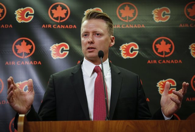 Calgary Flames new coach Glen Gulutzan speaks during a news conference in Calgary, Alberta, Friday, June 17, 2016. (Jeff McIntosh/The Canadian Press via AP)