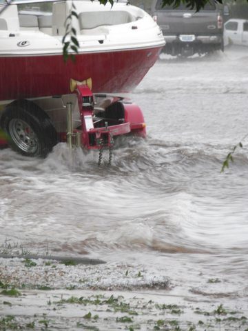 Flood waters flow down Brockton Way in Henderson Thursday, June 30, 2015. Natalie Burt/Special to the Las Vegas Review-Journal