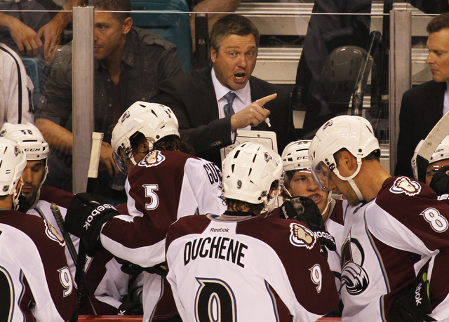 First-year Colorado Avalanche head coach Patrick Roy, middle, shouts instructions to his team as they take on the Los Angeles Kings during their Frozen Fury pre-season hockey game at the MGM Grand ...
