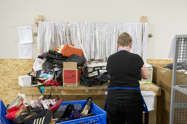 A Goodwill employee sorts goods at the Goodwill Retail and Donation Center on Maryland Parkway in Las Vegas at Boulevard Mall in Las Vegas on May 31, 2016. Bridget Bennett/Las Vegas Review-Journal ...