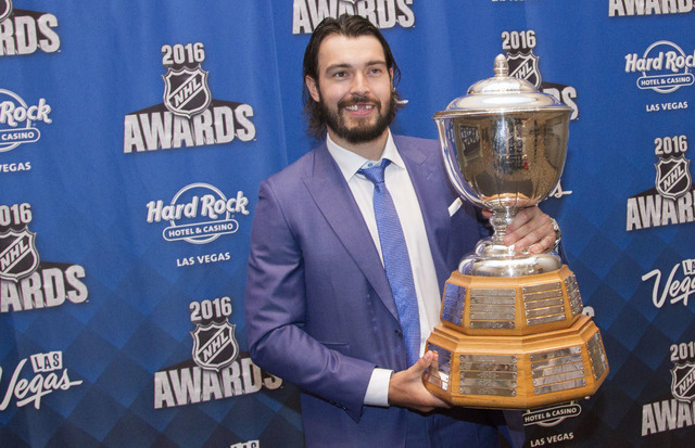 Los Angeles Kings' Drew Doughty holds the Norris Trophy after winning the award at the NHL Awards show held at the Hard Rock Hotel and Casino in Las Vegas on Wednesday, June 22, 2016. Richard Bria ...