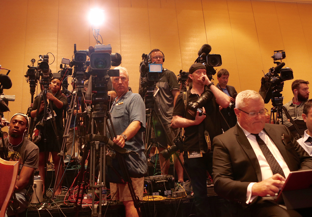 Videographers capture the announcement of hockey coming to Las Vegas at the NHL press conference on June 22, 2016. (Jeff Scheid/Las Vegas Review-Journal)
