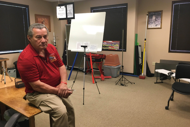 Jim Lytner, chief operating officer of the Veterans Transition Resource Center, 2550 Nature Park Drive, Suite 200, in North Las Vegas, sits on a table inside the center where he and his cohost RJ  ...