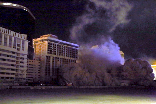 4 of 4-The Monaco tower at the shuttered Riviera comes crashing down in a controlled implosion on Tuesday, June 14, 2016.  Jeff Scheid/Las Vegas Review-Journal Follow @jlscheid