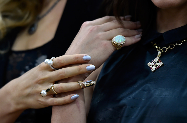 Models display pieces of jewelry during a panel discussion of new trends at the JCK Las Vegas jewelry industry show at the Mandalay Bay Convention Center Friday, June 3, 2016, in Las Vegas. David ...