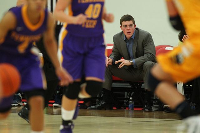 Marquette assistant coach Tyler Summitt, son of NCAA women's basketball coaching legend Pat Summitt, watches the action as the Golden Eagles take on Tennessee Tech at the South Point Arena in Las ...