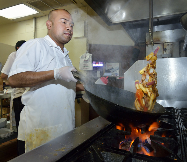 Herminio Flores cooks in the kitchen at Las Americas at 2319 S. Eastern Ave. in Las Vegas June 17, 2016. Bill Hughes/Las Vegas Review-Journal
