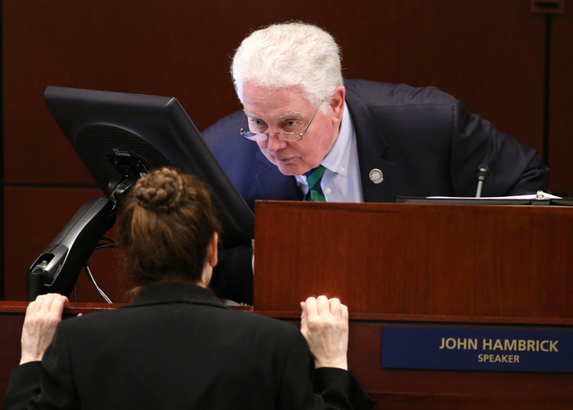 Nevada Assembly Speaker John Hambrick, R-Las Vegas, talks with Chief Clerk Susan Furlong on the Assembly floor at the Legislative Building in Carson City, Nev., on Friday, Feb. 13, 2015. A notice ...