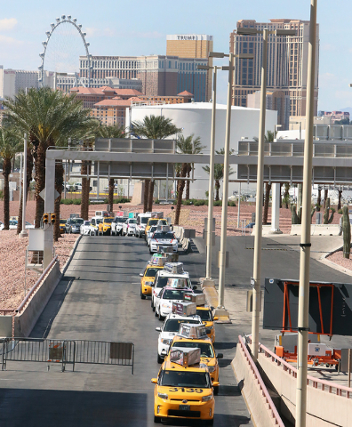 Taxi drivers lined up to pick up passengers from McCarran International Airport on Tuesday, April 26, 2016. (Bizuayehu Tesfaye/Las Vegas Review-Journal) Follow @bizutesfaye