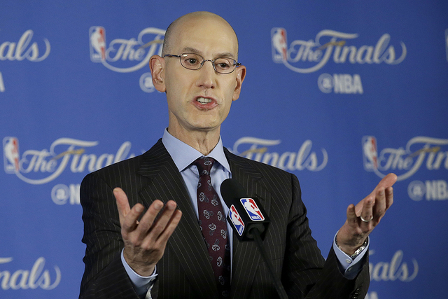 NBA commissioner Adam Silver speaks during a news conference before Game 1 of basketball's NBA Finals between the Golden State Warriors and the Cleveland Cavaliers in Oakland, Calif., Thursday, Ju ...
