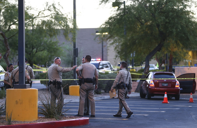 Las Vegas police investigate a homicide outside a Walgreens at Lake Mead and Jones boulevards in Las Vegas on Wednesday, June 29, 2016. Chase Stevens/Las Vegas Review-Journal Follow @csstevensphoto
