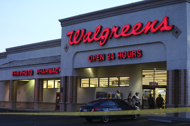 Las Vegas police investigate a homicide outside a Walgreens at Lake Mead and Jones Boulevards in Las Vegas on Wednesday, June 29, 2016. Chase Stevens/Las Vegas Review-Journal Follow @csstevensphoto
