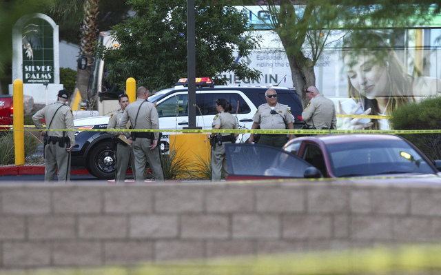 Las Vegas police investigate a homicide outside a Walgreens at Lake Mead and Jones boulevards in Las Vegas on Wednesday, June 29, 2016. Chase Stevens/Las Vegas Review-Journal Follow @csstevensphoto