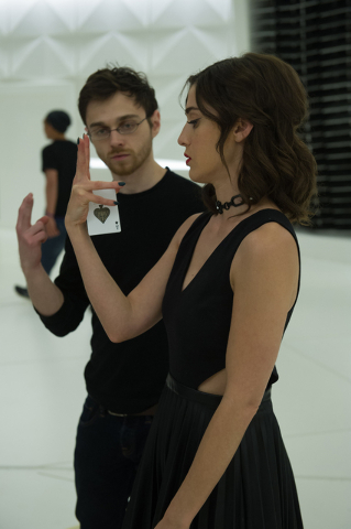 Cardistry Consultant Andrei Jikh and Lizzy Caplan on the set of NOW YOU SEE ME 2. Photo Credit: Jay Maidment