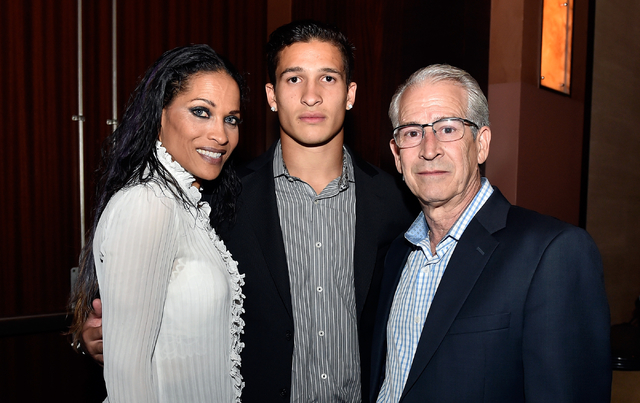Biaggio Ali Walsh, center, and his parents, Rasheda Ali Walsh, left, and Bob Walsh attend the Best of Nevada Preps awards banquet at the Red Rock hotel-casino Saturday, June 4, 2016, in Las Vegas. ...