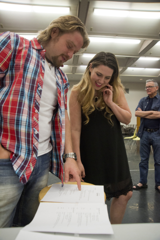 Singers Suzanne Vinnik and Viktor Antipenko review the rehearsal schedule for Opera Las Vegas' "Carmen," which will be staged Friday and Sunday in UNLV's Judy Bayley Theatre. Daniel Clark/Las Vega ...