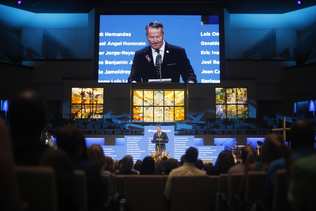 Orlando Mayor Buddy Dyer addresses attendees at a service to honor victims of the Orlando nightclub shooting at the First Baptist Orlando Church in Orlando, Florida on Tuesday, June 14, 2016. (Rac ...