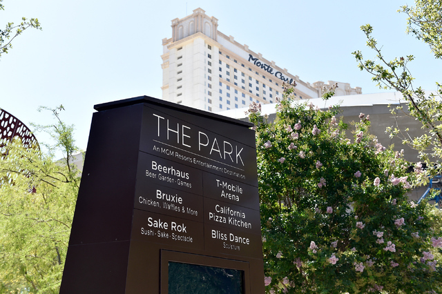 The Monte Carlo hotel-casino is seen near The Park Friday, June 3, 2016, in Las Vegas. MGM Resorts International announced the Monte Carlo will be transformed into two hotels -- the Park MGM and t ...