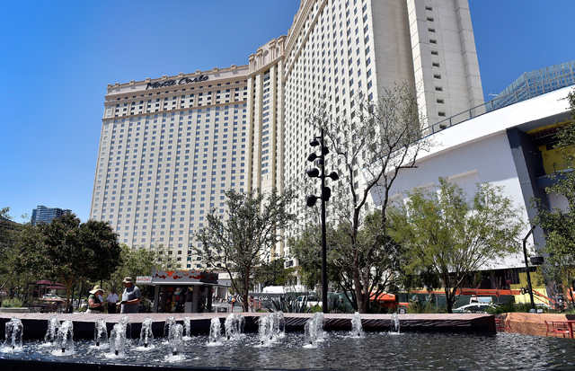The Monte Carlo hotel-casino is seen near The Park Friday, June 3, 2016, in Las Vegas. MGM Resorts International announced the Monte Carlo will be transformed into two hotels -- the Park MGM and t ...