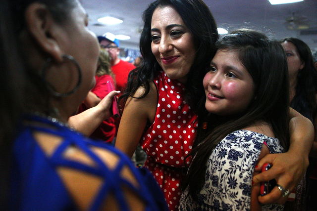 Mariana Kihuen, sister of Democratic Congressional District 4 candidate Ruben Kihuen celebrates with supporters during election night watch party at Culinary Workers Union Local 226 in Las Vegas o ...