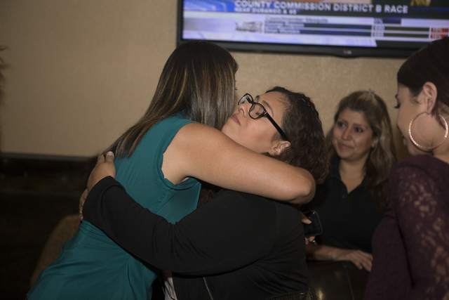 Democratic Congressional District 4 candidate Lucy Flores, left, hugs her niece Vivian Flores after giving her concession speech during her election night party at Aces & Ales on Tuesday, June ...