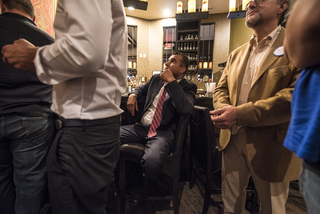 Democratic Congressional District 3 candidate Jesse Sbaih, center, watches the news for results during a campaign event at Origin India Restaurant in Las Vegas on Tuesday, June 14, 2016. Joshua Da ...